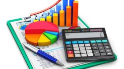 Creative abstract business finance, tax, accounting, banking, statistics and money analytic research concept: office electronic calculator, bar graph and pie diagram and pen on financial reports in clipboard with colorful data isolated on white background